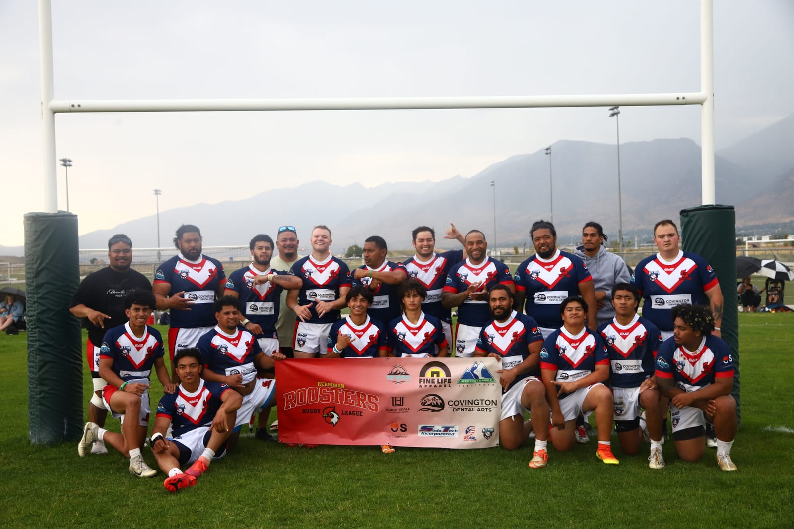 The Top Notch Movers rugby squad lined up on the pitch