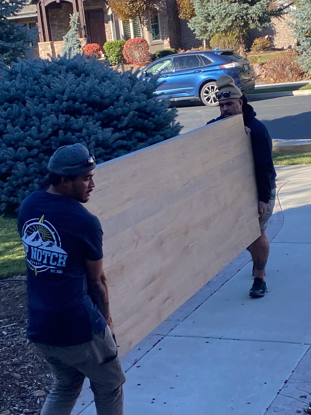 Carrying a wrapped piece out to the truck