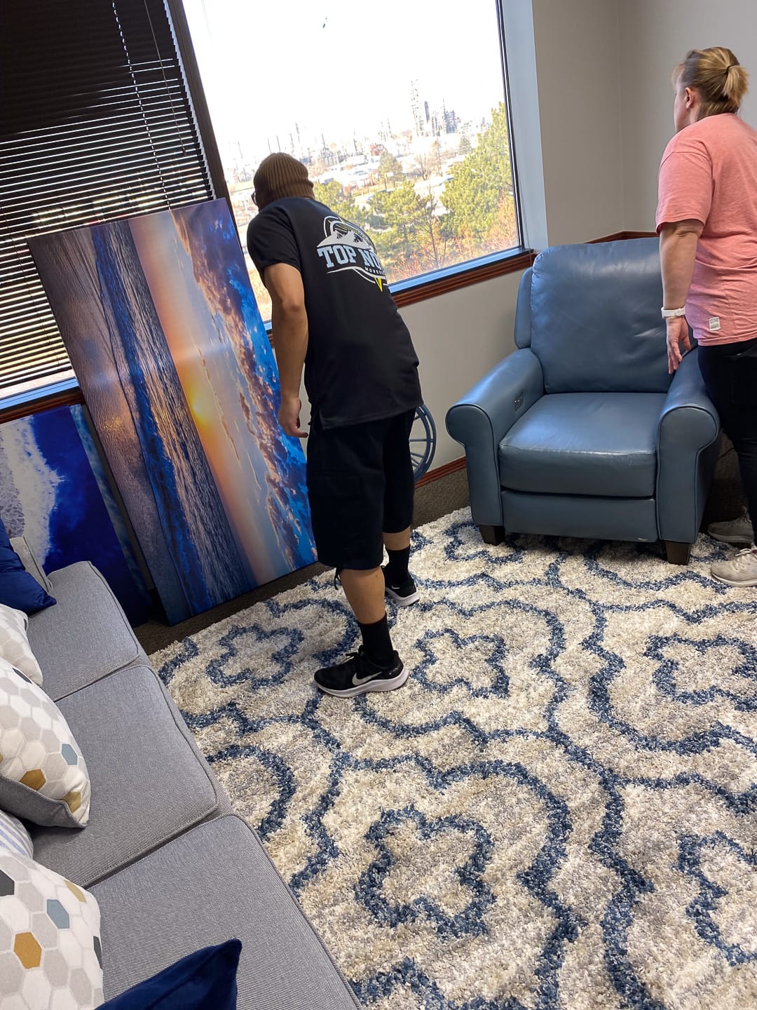 Artwork and recliner carried into the family room