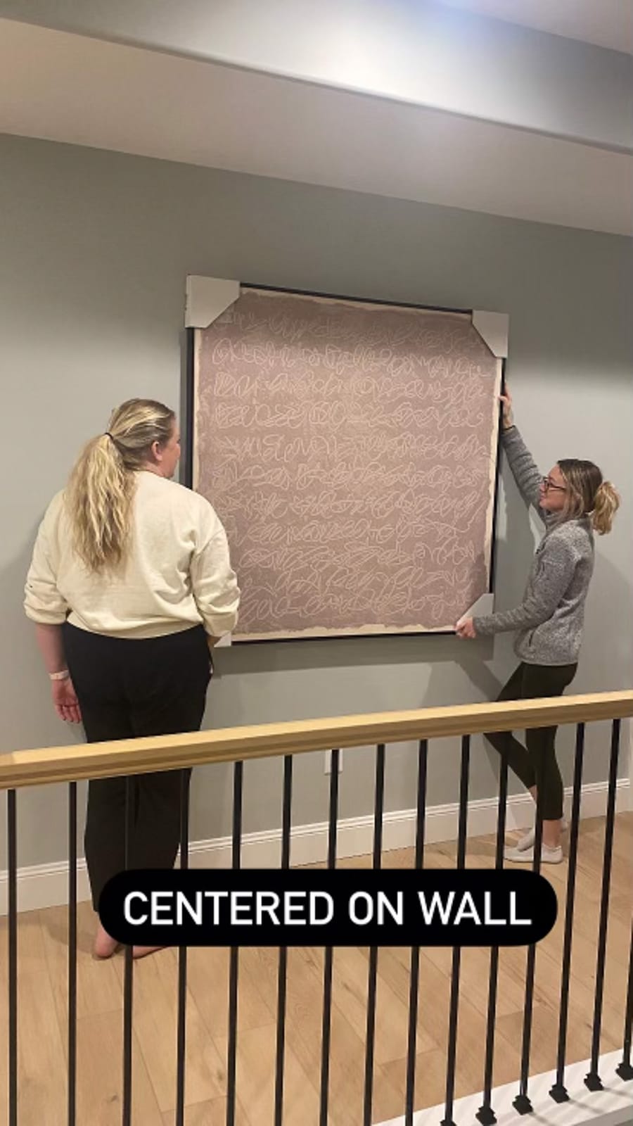 Hanging a statement frame on the stair landing