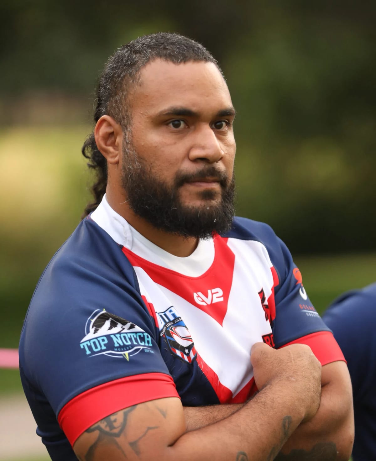 Match-day portrait in the Top Notch–sponsored kit
